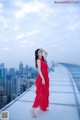 Beauty Crystal Lee ventured into blooming on the roof of a high-rise building (8 photos) P5 No.6ed6bb