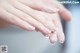 A close up of a person's hands with soap on them.